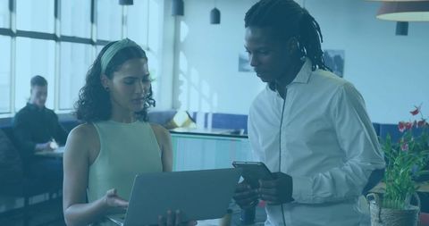 Creative professionals collaborating in modern coworking space