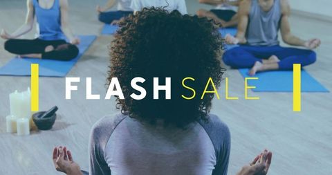 Meditation class leader guiding group yoga session with flash sale banner