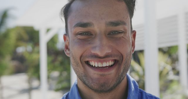 Close-Up Portrait of Smiling Man Outdoors on a Sunny Day - Download Free Stock Images Pikwizard.com