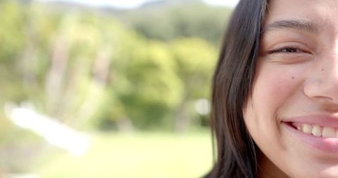 Half Portrait of Teen Girl Smiling in Sunny Garden - Download Free Stock Images Pikwizard.com