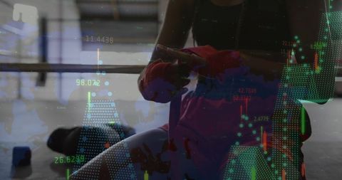 Female Athlete Winding Hand Wraps with Digital Data Overlay