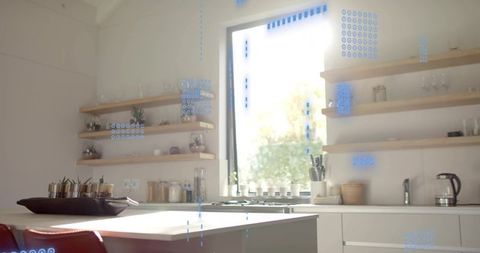 Sunlit Modern Kitchen Showcasing Central Island with Dark Tray, Open Shelves and Greenery