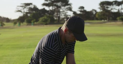 Caucasian Male Golfer Practicing on Picturesque Golf Course - Download Free Stock Images Pikwizard.com