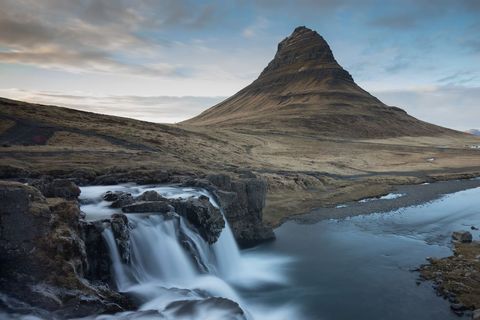 Kirkjufell Mountain and Waterfall at Dusk, Iceland Landscape with Flowing Water
