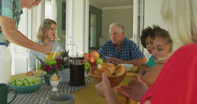 Multigenerational Family Enjoying Breakfast Together at Home - Download Free Stock Images Pikwizard.com