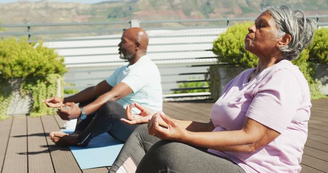 Senior couple practicing outdoor yoga meditation on patio - Download Free Stock Images Pikwizard.com