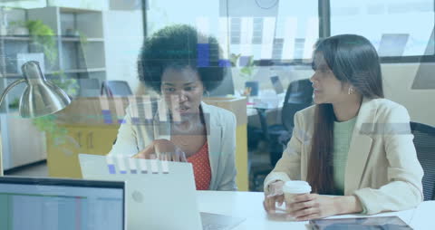 Diverse Team Analyzing Financial Data Visuals