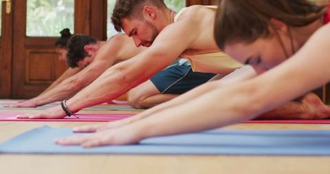 Diverse Group Practicing Yoga and Stretching in Health Studio - Download Free Stock Images Pikwizard.com