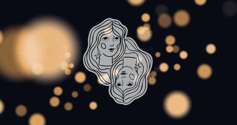 Gemini zodiac sign with abstract bokeh background