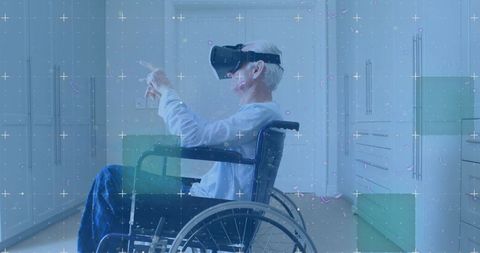 Senior man in wheelchair experiencing virtual reality world