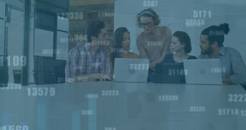 Diverse Team Collaborating on Data-Driven Projects in Modern Office