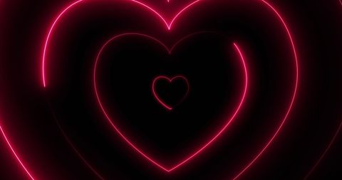 Vibrant Neon Hearts on Black Background for Romantic Designs