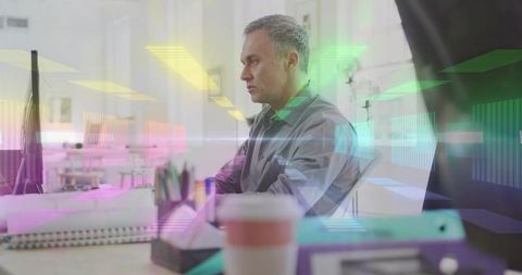 Focused Office Worker in Modern Open-Plan Workspace with Digital Overlay