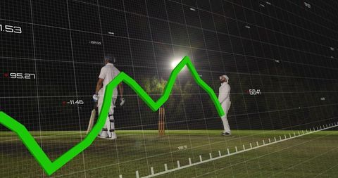 Cricket players standing on night pitch holding bat with green analytics overlay