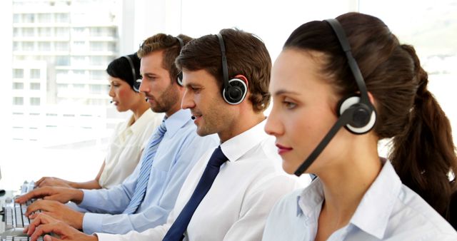 Focused Team of Call Center Operators Working in Modern Office - Download Free Stock Images Pikwizard.com